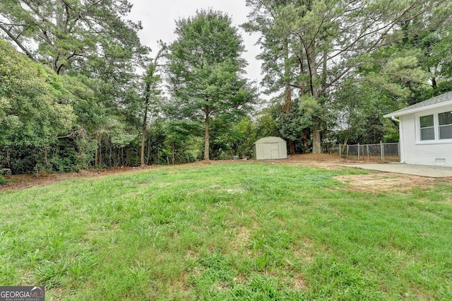 1094 SW Amber Rdg SW, Lilburn, GA 30047 - view of yard featuring a storage shed