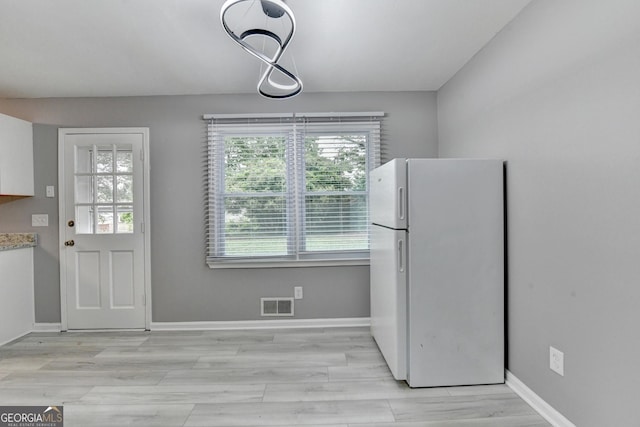 1094 SW Amber Rdg SW, Lilburn, GA 30047 - unfurnished dining area with baseboards