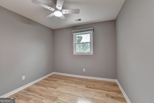1094 SW Amber Rdg SW, Lilburn, GA 30047 - unfurnished room featuring wood finished floors and a ceiling fan