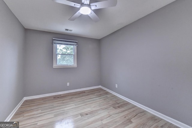 1094 SW Amber Rdg SW, Lilburn, GA 30047 - spare room with light wood-style flooring and ceiling fan