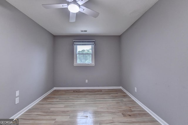 1094 SW Amber Rdg SW, Lilburn, GA 30047 - spare room with ceiling fan and light wood-style floors