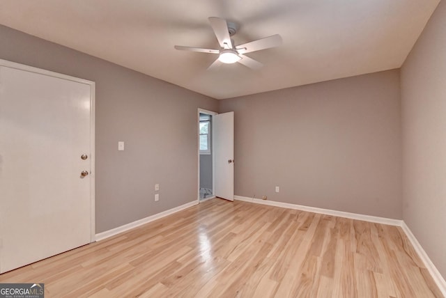 1094 SW Amber Rdg SW, Lilburn, GA 30047 - empty room with a ceiling fan and light wood finished floors