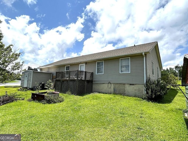 2557 Bartley Rd, Lagrange, GA 30240 - rear view of house with a yard and a storage shed