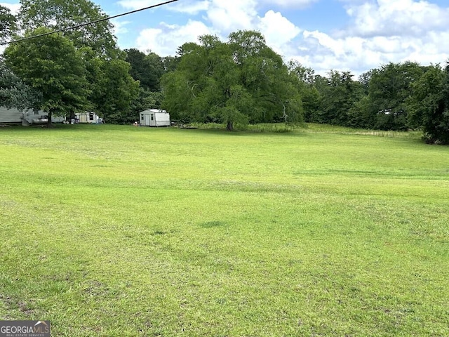 2557 Bartley Rd, Lagrange, GA 30240 - view of green lawn with a shed
