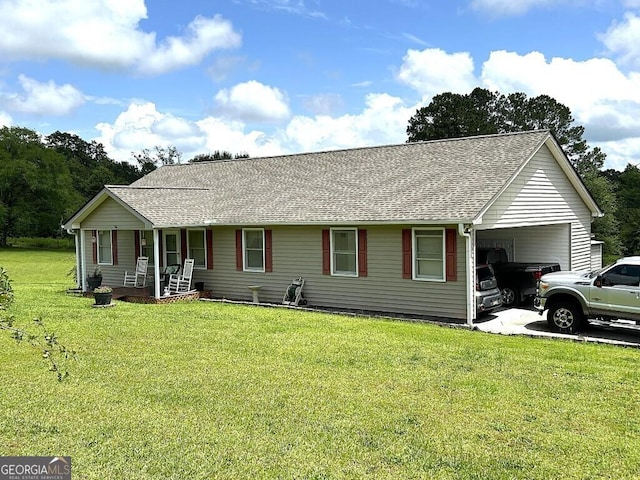2557 Bartley Rd, Lagrange, GA 30240 - ranch-style home with a porch, a carport, a shingled roof, and a front yard