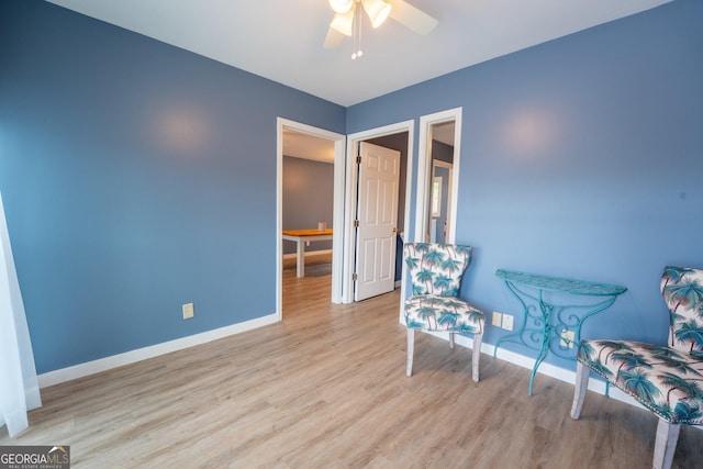 46 Wall Street Way, Toccoa, GA 30577 - sitting room with ceiling fan and wood finished floors