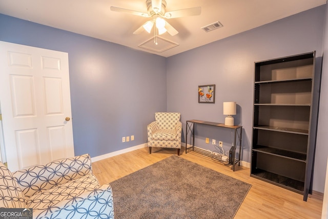 46 Wall Street Way, Toccoa, GA 30577 - sitting room with wood finished floors and ceiling fan
