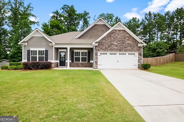 132 Berkleigh Trails Dr, Hiram, GA 30141 - craftsman-style home with stone siding, an attached garage, and driveway
