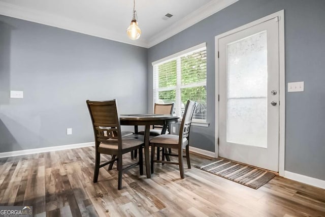 132 Berkleigh Trails Dr, Hiram, GA 30141 - dining room featuring crown molding and wood finished floors
