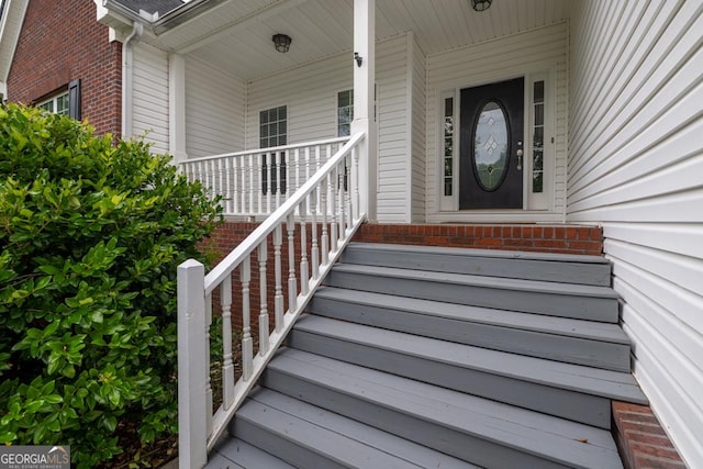 4371 Shag Bark Trl, Gainesville, GA 30507 - doorway to property with brick siding and a porch
