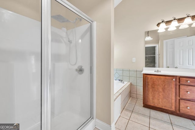 4371 Shag Bark Trl, Gainesville, GA 30507 - bathroom featuring tile patterned flooring, a shower stall, vanity, and a bath