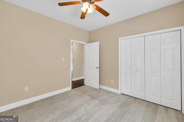4371 Shag Bark Trl, Gainesville, GA 30507 - unfurnished bedroom with carpet floors, a closet, and ceiling fan