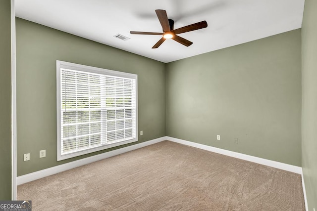 4371 Shag Bark Trl, Gainesville, GA 30507 - carpeted spare room featuring a ceiling fan and baseboards