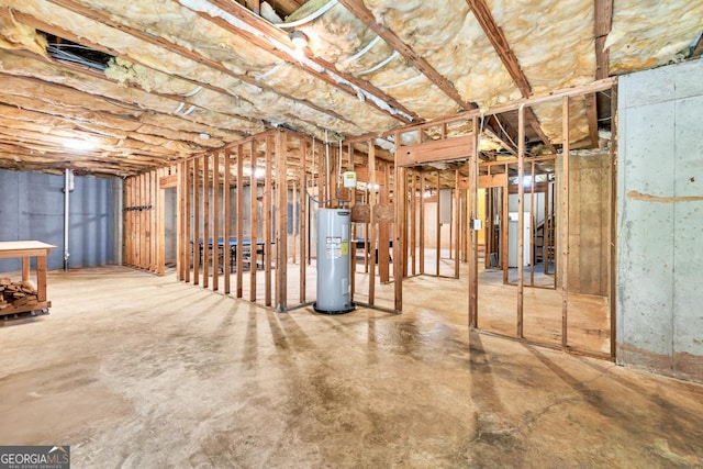 4371 Shag Bark Trl, Gainesville, GA 30507 - unfinished below grade area with electric water heater and washer / clothes dryer