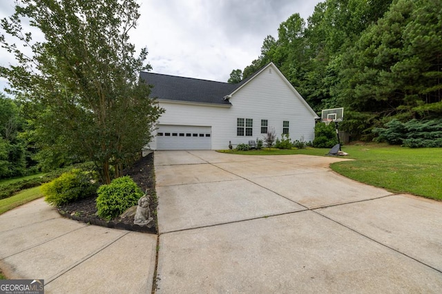 4371 Shag Bark Trl, Gainesville, GA 30507 - view of property exterior with concrete driveway, a yard, and a garage