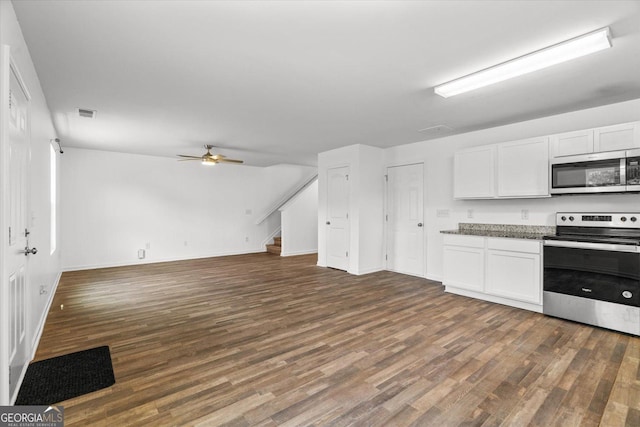104 Middleton Ct, Chatsworth, GA 30705 - kitchen with appliances with stainless steel finishes, dark wood-type flooring, white cabinets, and ceiling fan