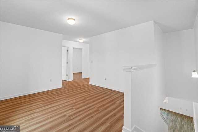 104 Middleton Ct, Chatsworth, GA 30705 - unfurnished room with light wood-type flooring and baseboards