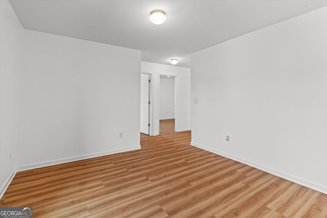 104 Middleton Ct, Chatsworth, GA 30705 - empty room with light wood-type flooring and baseboards