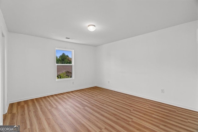 104 Middleton Ct, Chatsworth, GA 30705 - unfurnished room with light wood-style floors and baseboards