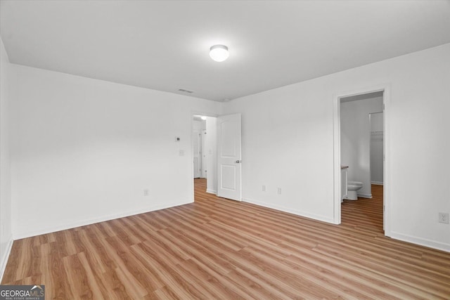 104 Middleton Ct, Chatsworth, GA 30705 - unfurnished bedroom featuring light wood-type flooring and baseboards