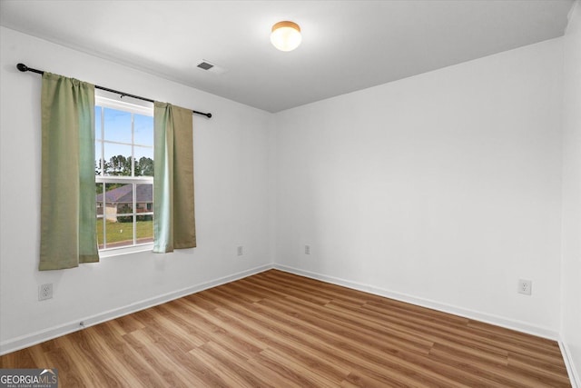 104 Middleton Ct, Chatsworth, GA 30705 - empty room featuring wood finished floors and baseboards