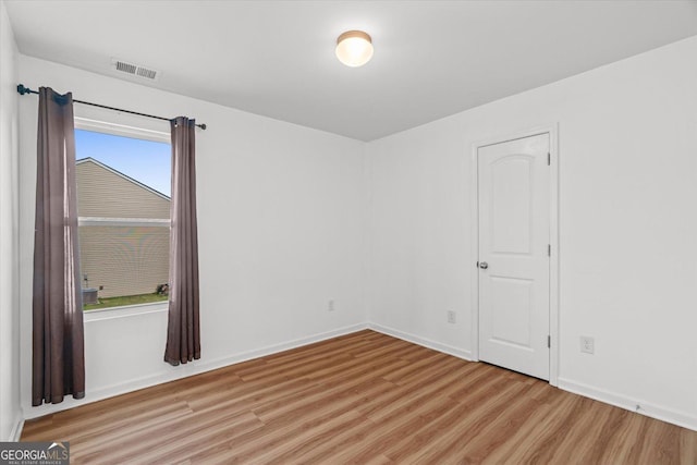 104 Middleton Ct, Chatsworth, GA 30705 - spare room with light wood finished floors and baseboards