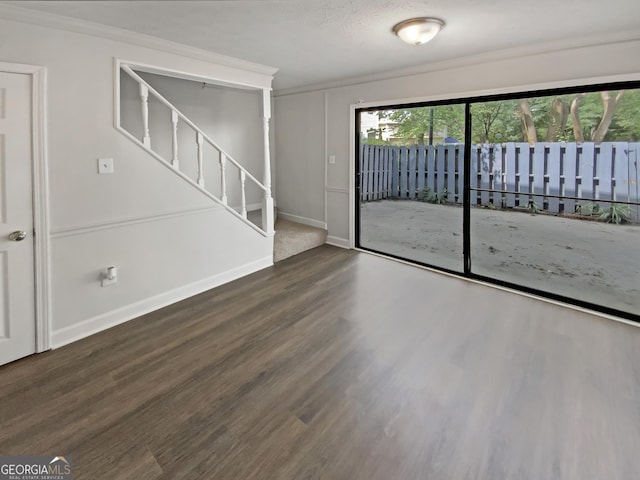 1480 D NE Pine Log Rd Unit D, Conyers, GA 30012 - empty room with wood finished floors, stairway, and ornamental molding
