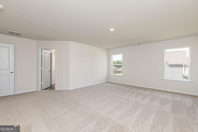 288 Oliver Dr, Locust Grove, GA 30248 - unfurnished room with light carpet and baseboards