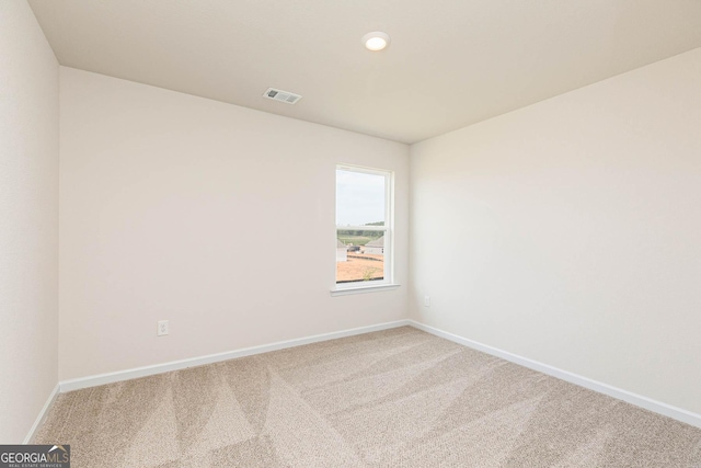 288 Oliver Dr, Locust Grove, GA 30248 - carpeted empty room featuring baseboards