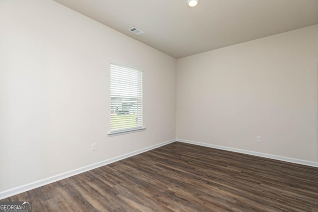 288 Oliver Dr, Locust Grove, GA 30248 - unfurnished room featuring dark wood finished floors