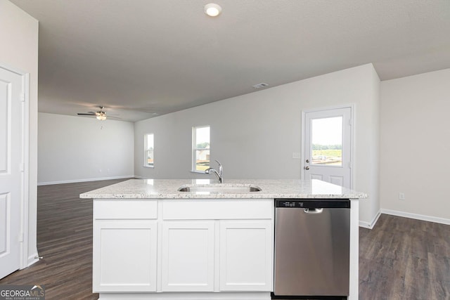 288 Oliver Dr, Locust Grove, GA 30248 - kitchen featuring stainless steel dishwasher, dark wood-type flooring, light stone counters, and white cabinets