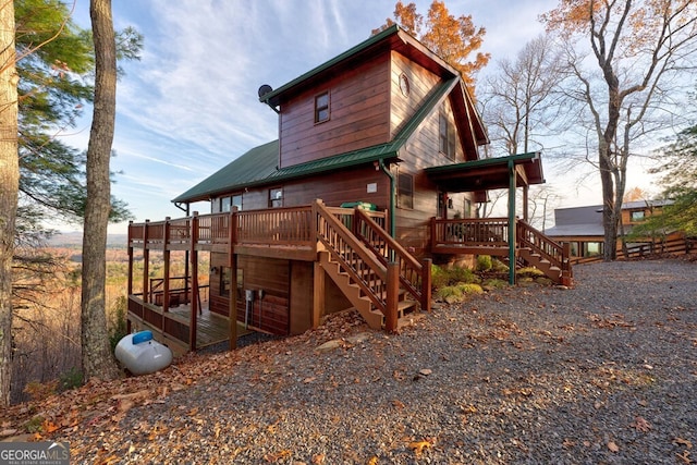 588 Tower Rd, Mineral Bluff, GA 30559 - back of house featuring stairway, a deck, and a metal roof