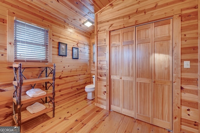 588 Tower Rd, Mineral Bluff, GA 30559 - bathroom featuring wood walls and wood-type flooring