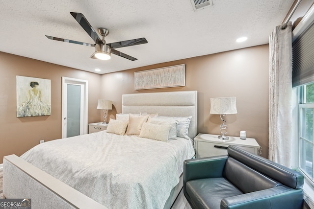 4467 Pineridge Cir, Atlanta, GA 30338 - bedroom with a textured ceiling, recessed lighting, and a ceiling fan