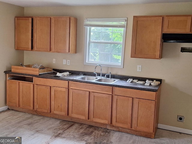 503 S 6th, Lanett, AL 36863 - kitchen with dark countertops and light wood finished floors
