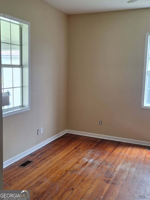 503 S 6th, Lanett, AL 36863 - spare room with hardwood / wood-style flooring and baseboards