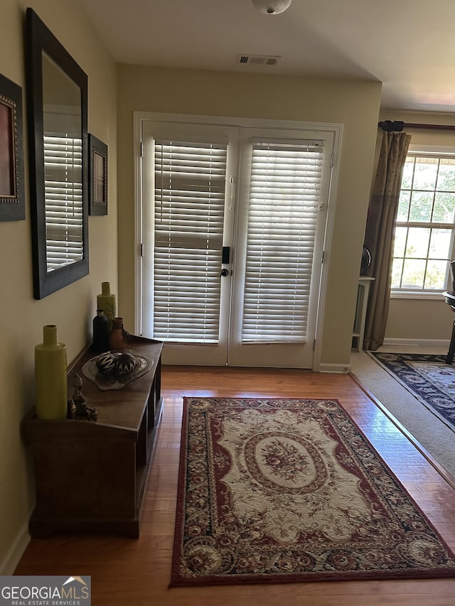 7946 Gossamer Dr, Fairburn, GA 30213 - doorway featuring wood finished floors and french doors