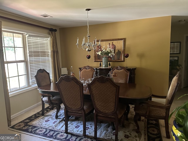 7946 Gossamer Dr, Fairburn, GA 30213 - dining space with a chandelier and baseboards