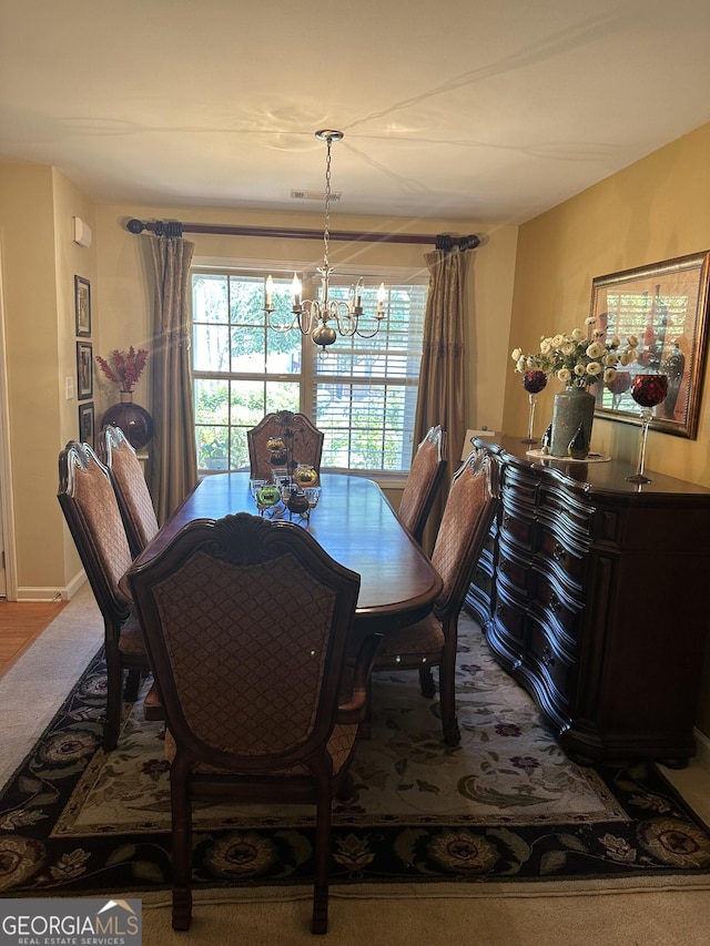 7946 Gossamer Dr, Fairburn, GA 30213 - dining room with a chandelier