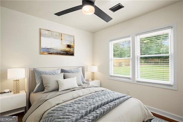 821 Springvalley Dr, Forest Park, GA 30297 - bedroom with a ceiling fan and wood finished floors