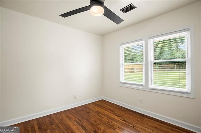821 Springvalley Dr, Forest Park, GA 30297 - empty room featuring ceiling fan and dark wood-style floors