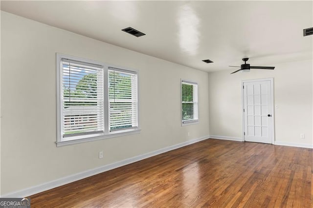 821 Springvalley Dr, Forest Park, GA 30297 - spare room featuring wood finished floors and a ceiling fan