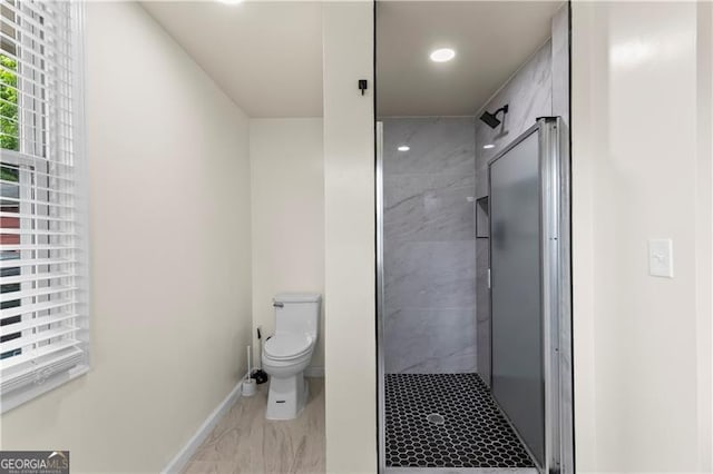 821 Springvalley Dr, Forest Park, GA 30297 - full bath featuring a stall shower, marble finish floors, and recessed lighting