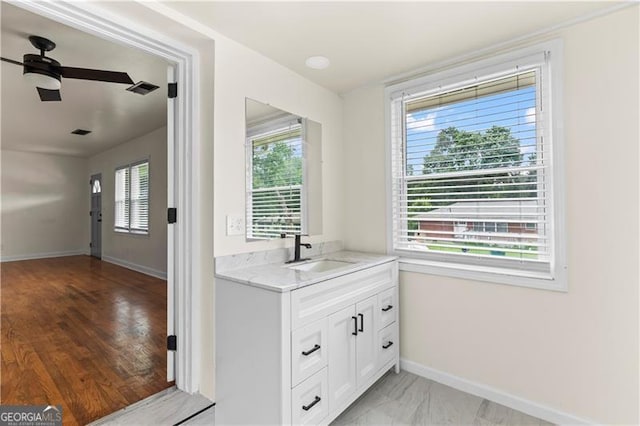 821 Springvalley Dr, Forest Park, GA 30297 - bathroom featuring a ceiling fan and vanity