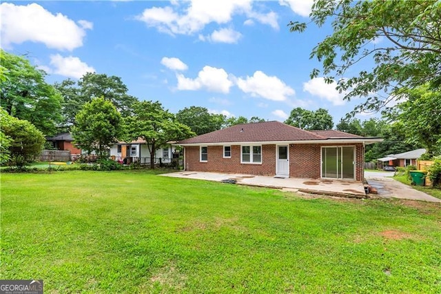 821 Springvalley Dr, Forest Park, GA 30297 - rear view of property featuring a patio and brick siding