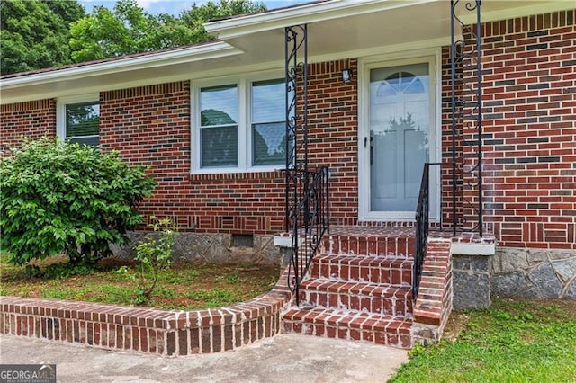 821 Springvalley Dr, Forest Park, GA 30297 - doorway to property featuring brick siding