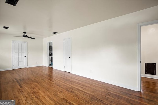 821 Springvalley Dr, Forest Park, GA 30297 - spare room featuring wood finished floors and ceiling fan