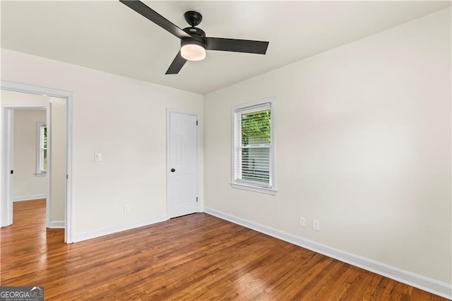 821 Springvalley Dr, Forest Park, GA 30297 - spare room with wood finished floors and a ceiling fan