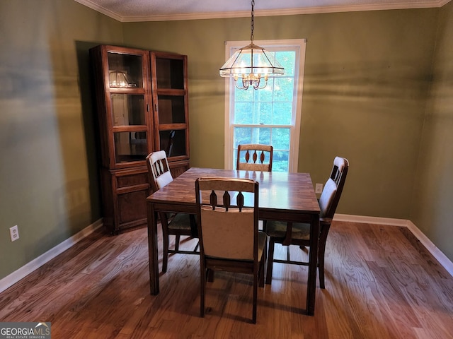 3054 Whisper Knob Rd, Marietta, GA 30062 - dining space with a chandelier, wood finished floors, and ornamental molding