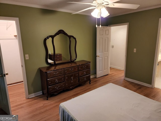 3054 Whisper Knob Rd, Marietta, GA 30062 - bedroom with crown molding, wood finished floors, and ceiling fan